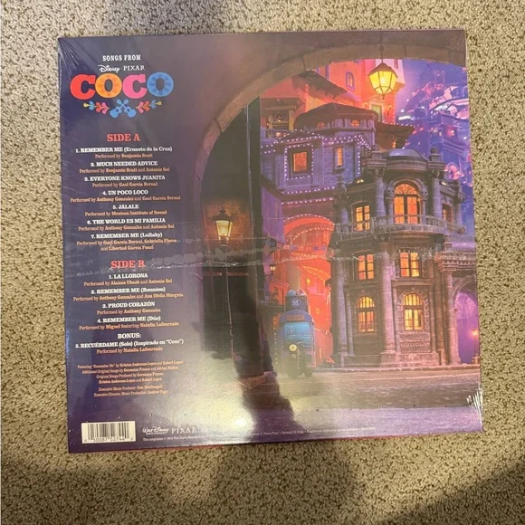 Disney Pixar Coco Vinyl - Vibrant Orange and White. SEALED EXCLUSIVE edition - Picture 2 of 2